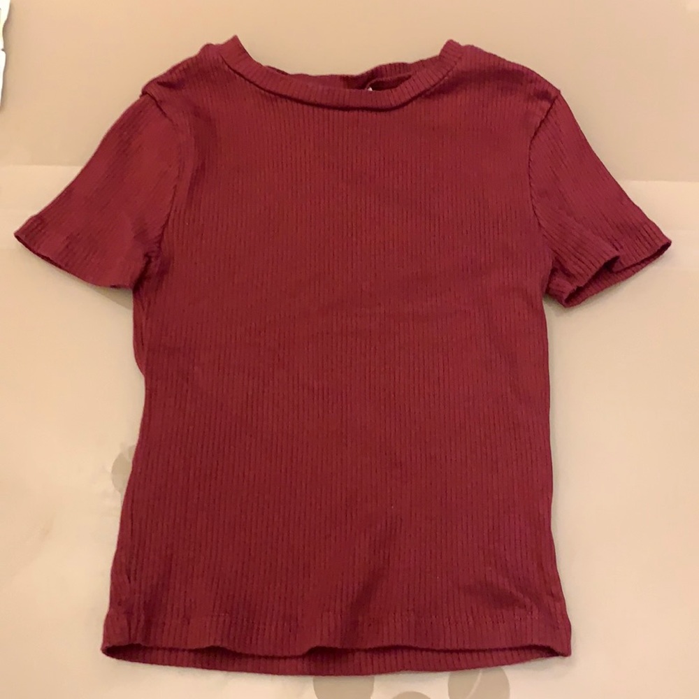 burgundy colored tight fitting shirt
